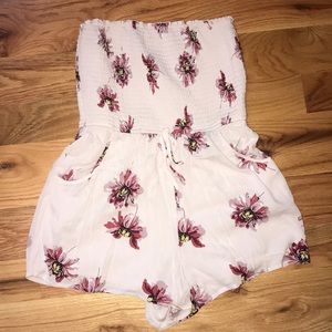 pocketed strapless smocked floral romper